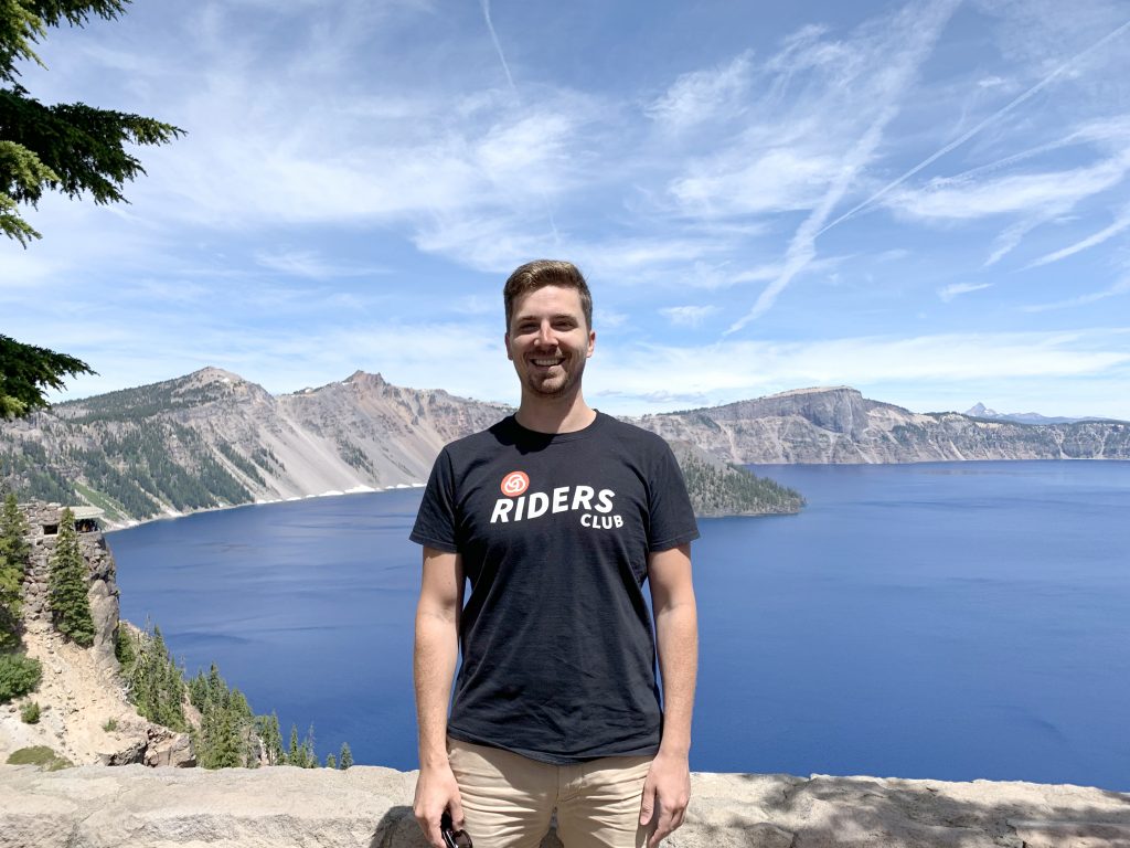 Image of Kevin Glenn standing with Crater Lake in the background